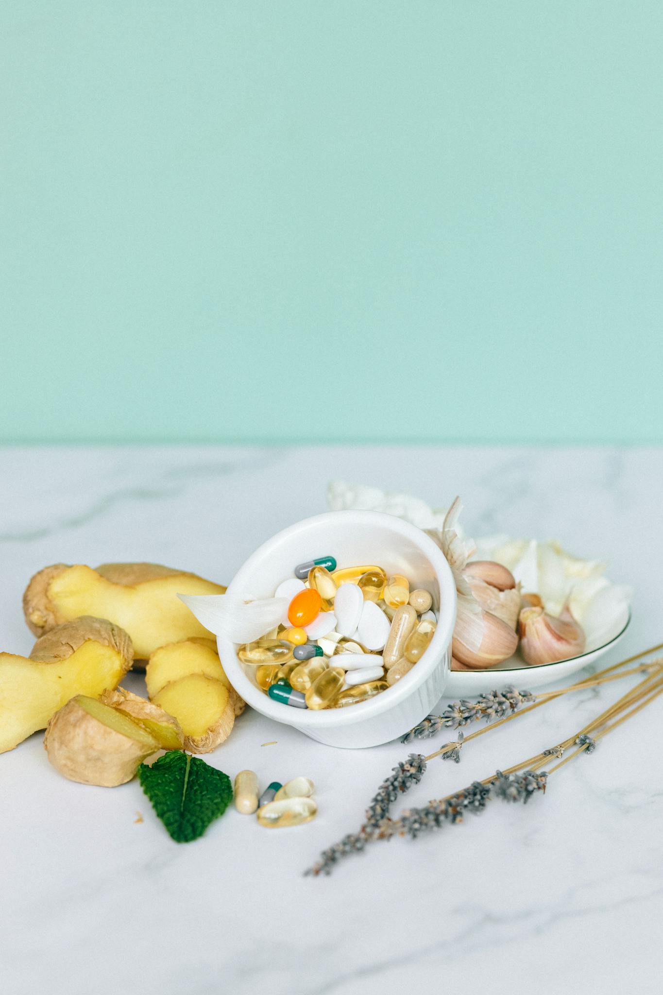 A selection of natural supplements featuring ginger, garlic, and herbs for holistic health benefits.